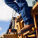 Worker stepping down machinery in Durango Maverick XP Steel Toe Waterproof Boots